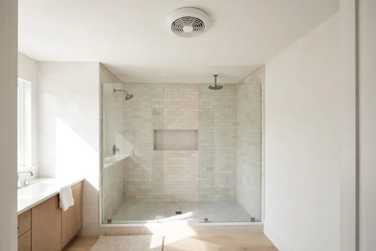 Bathroom exhaust fan size guide — ceiling-mounted exhaust fan above a modern shower in a Kingsport TN bathroom remodel